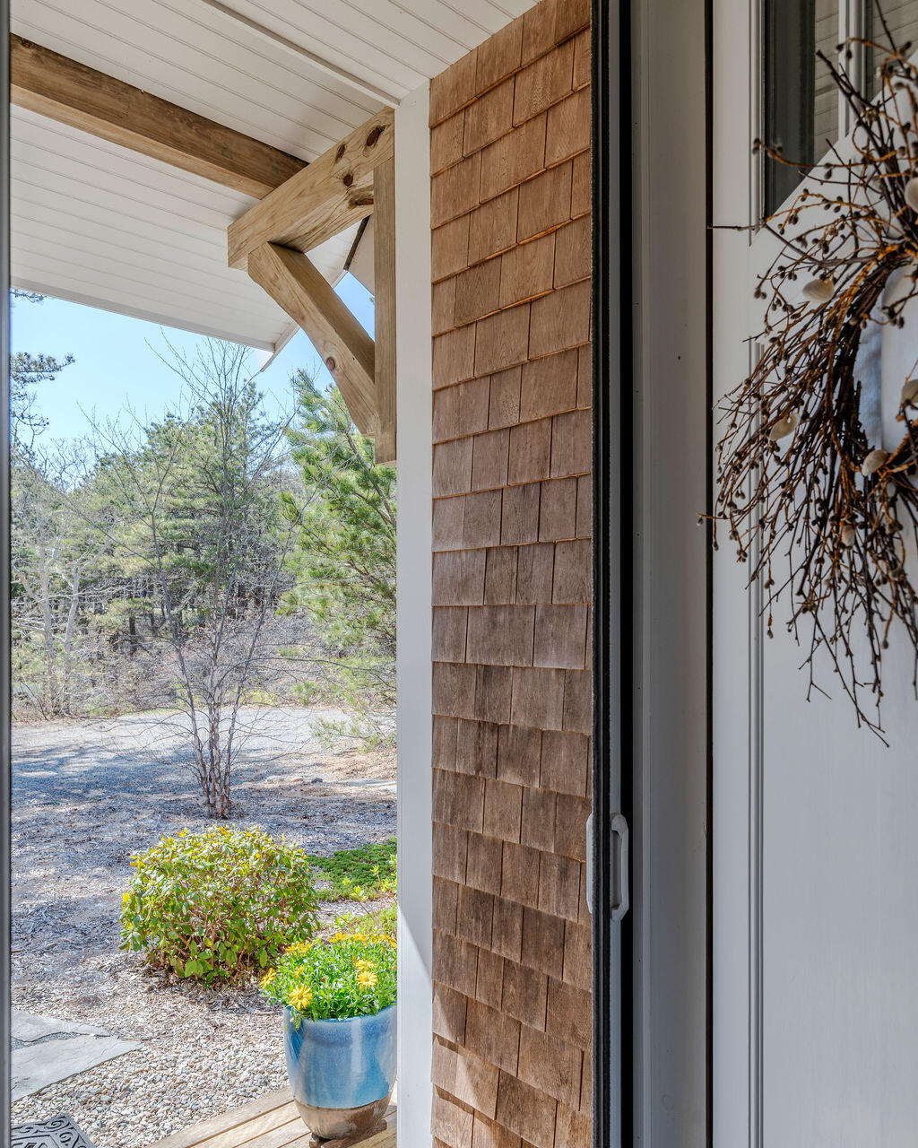 43 South Highland Road Truro, MA 02666 - Photo 2 of 40 a view of a back yard from a corridor