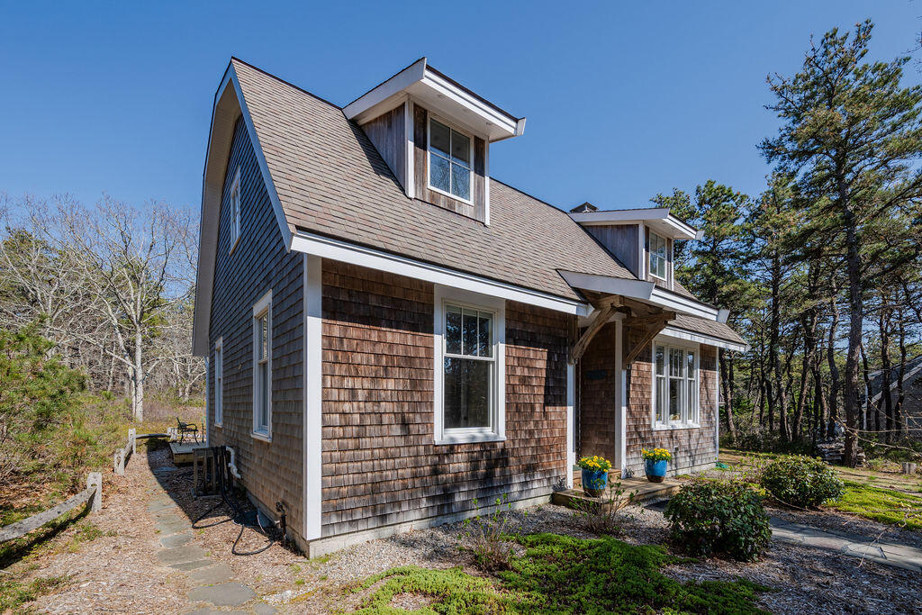 43 South Highland Road Truro, MA 02666 - Photo 28 of 40 a front view of a house with garden