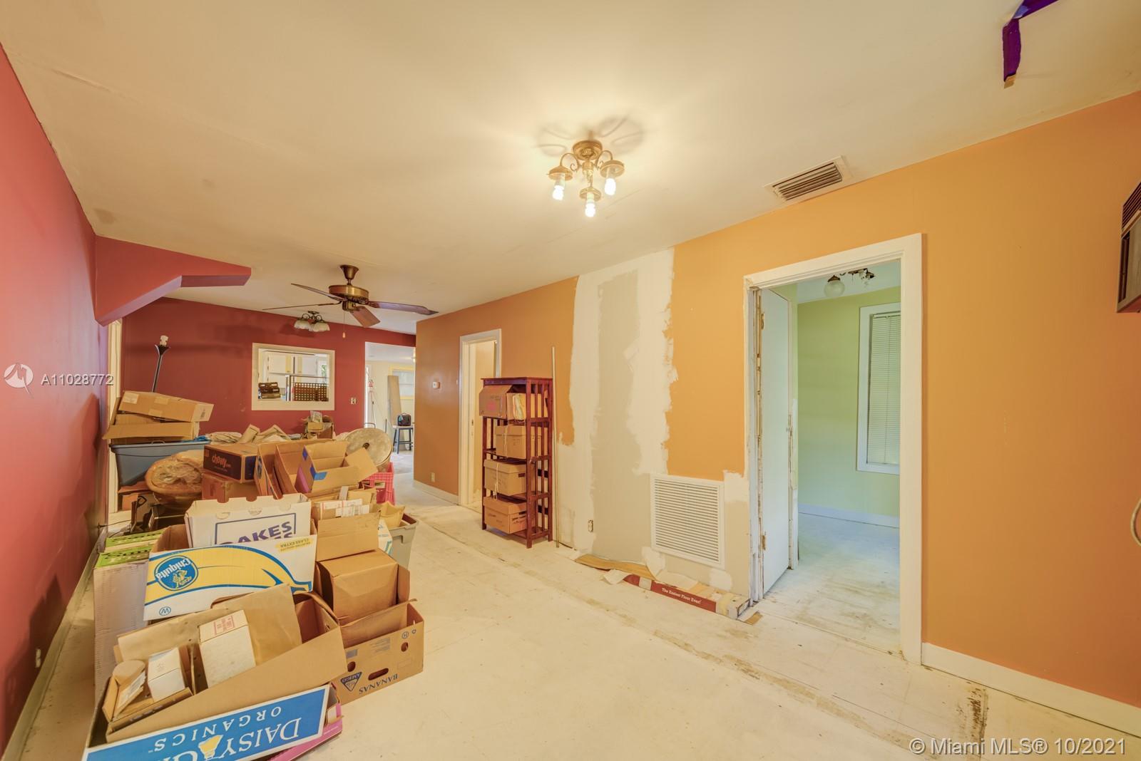 477 Northeast 154th Street Miami, FL 33162 - Photo 4 of 26 a view of a livingroom with furniture
