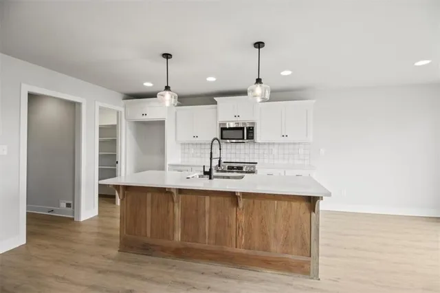 $369,900 | 311 Northeast 51st Road, Warrensburg, MO 64093