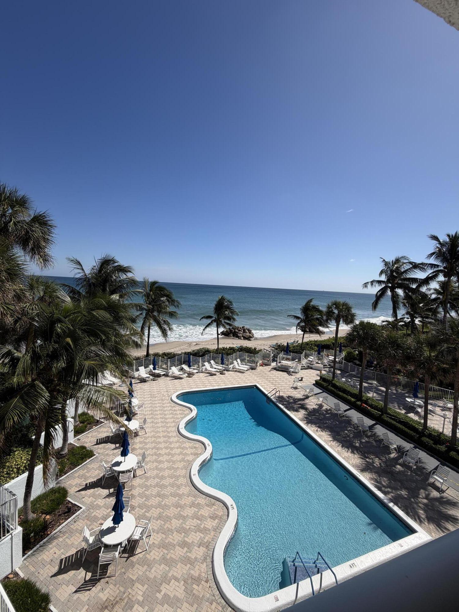 500 Southeast 21st Avenue, Unit 409 Deerfield Beach, FL 33441 - Photo 13 of 14 a view of a swimming pool and outdoor space