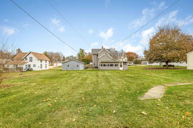 a view of a house with a big yard