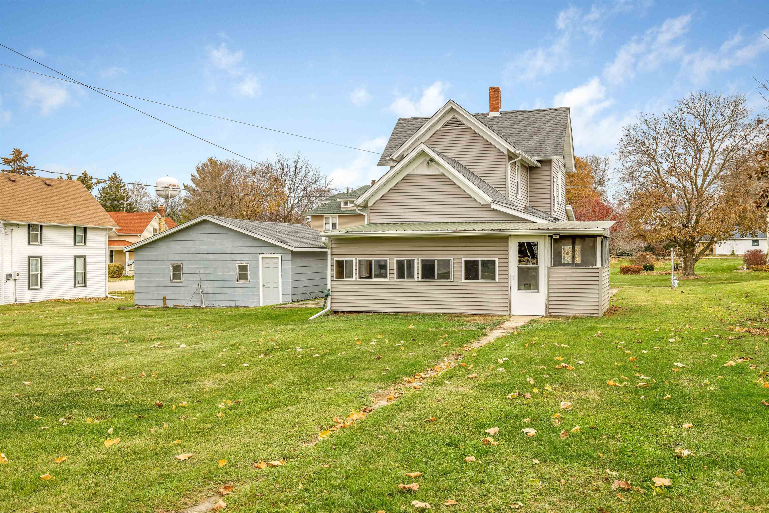 209 South Elida Street Winnebago, IL 61088 - Photo 41 of 48 a view of a house with a big yard