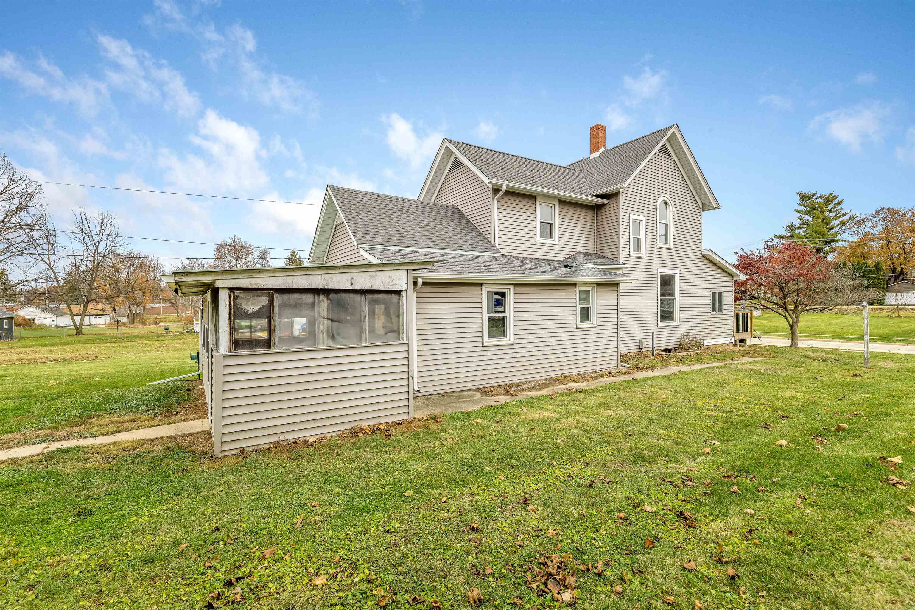 209 South Elida Street Winnebago, IL 61088 - Photo 42 of 48 a front view of a house with a yard