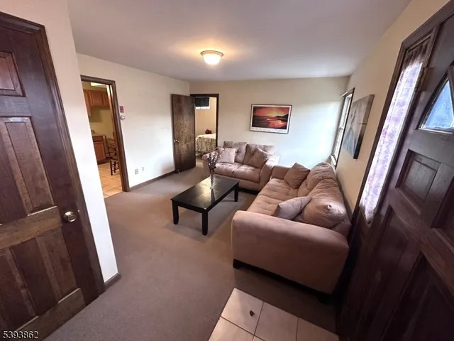 a kitchen with a stove a sink and a refrigerator