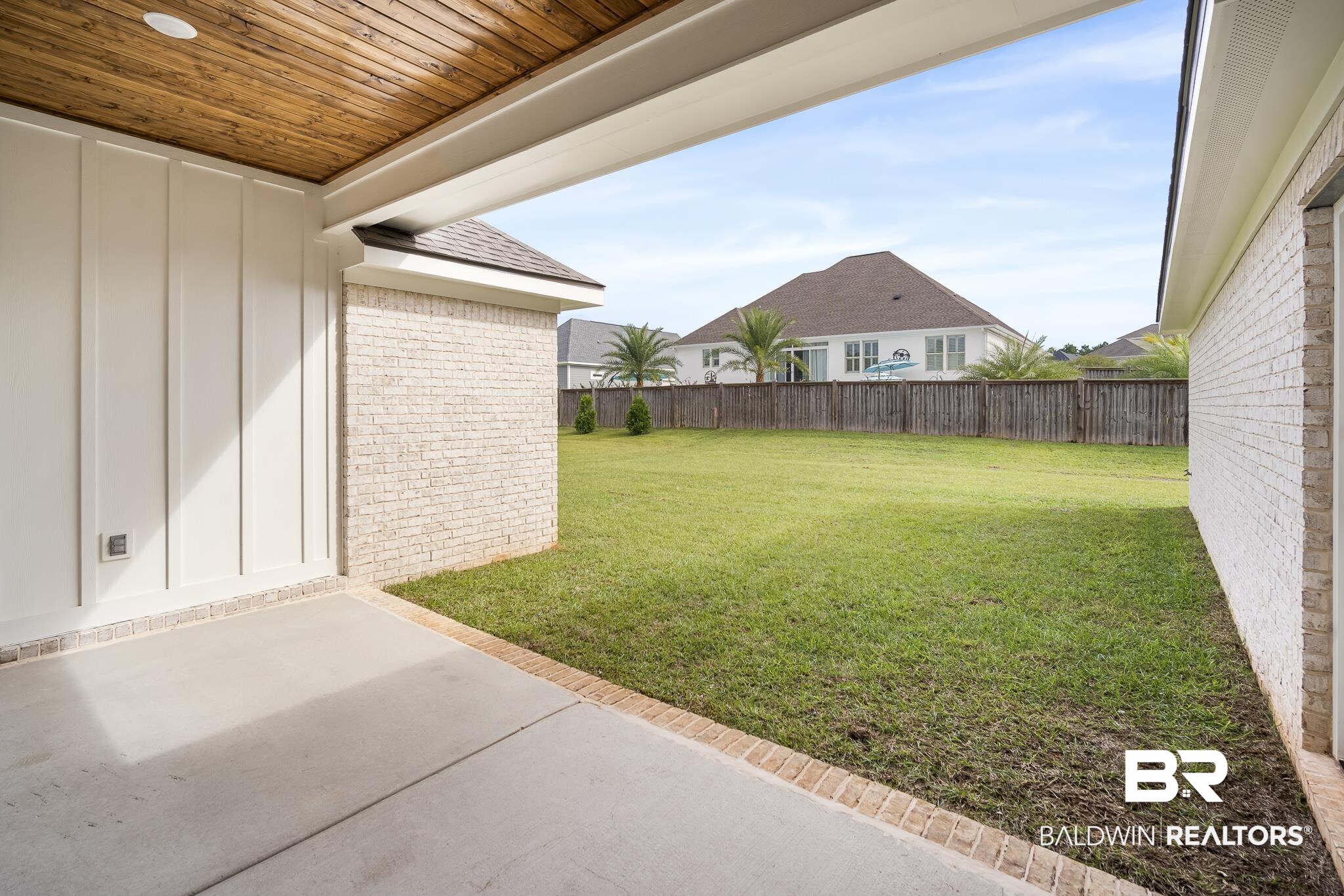 21826 Veranda Boulevard Fairhope, AL 36532 - Photo 32 of 42 Fenced backyard featuring a patio area