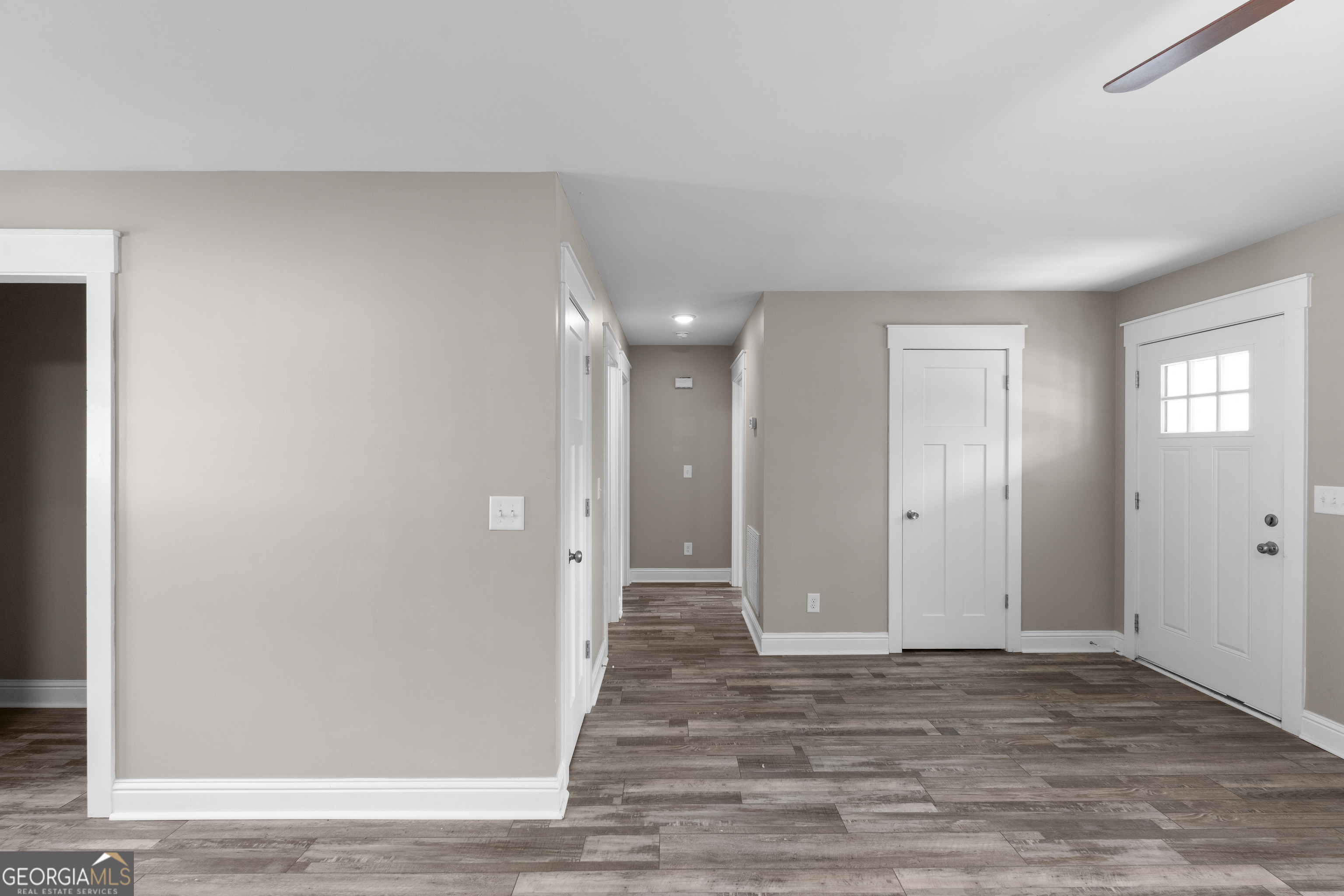 115 Buster Lane Rocky Face, GA 30740 - Photo 14 of 28 a view of a hallway with wooden floor
