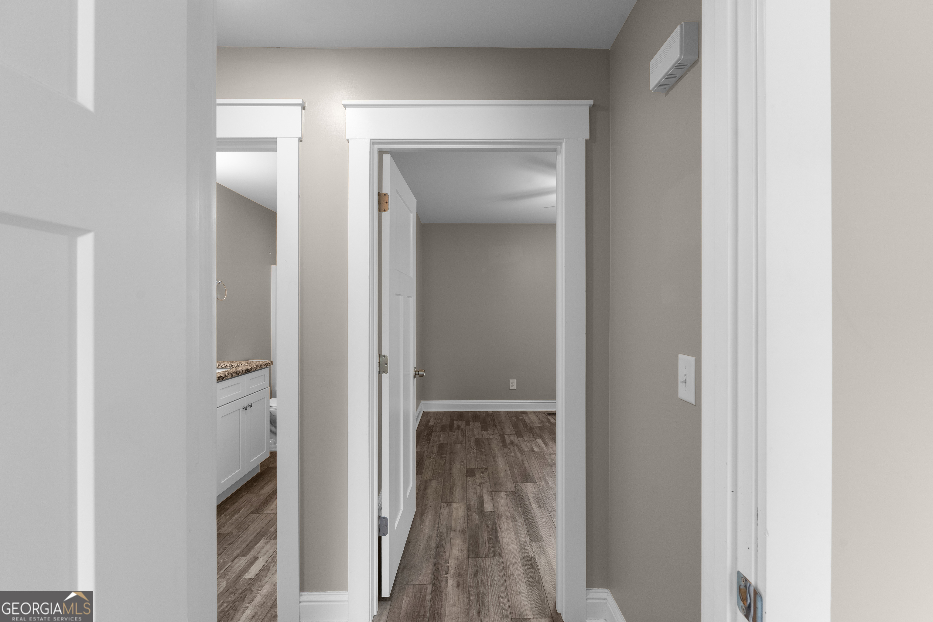 115 Buster Lane Rocky Face, GA 30740 - Photo 16 of 28 a view of hallway with walk in closet and wooden floor
