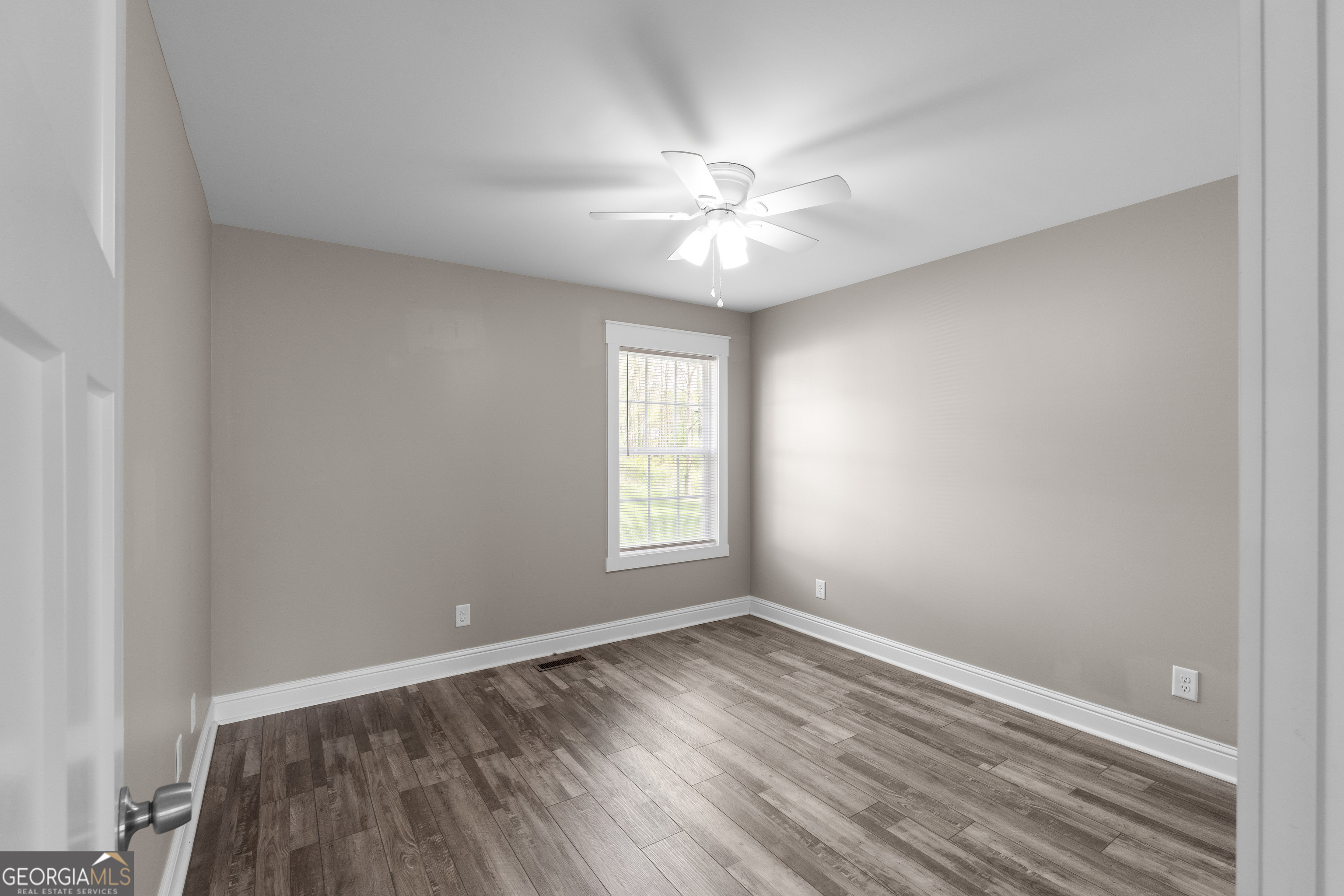 115 Buster Lane Rocky Face, GA 30740 - Photo 17 of 28 wooden floor in an empty room with a window