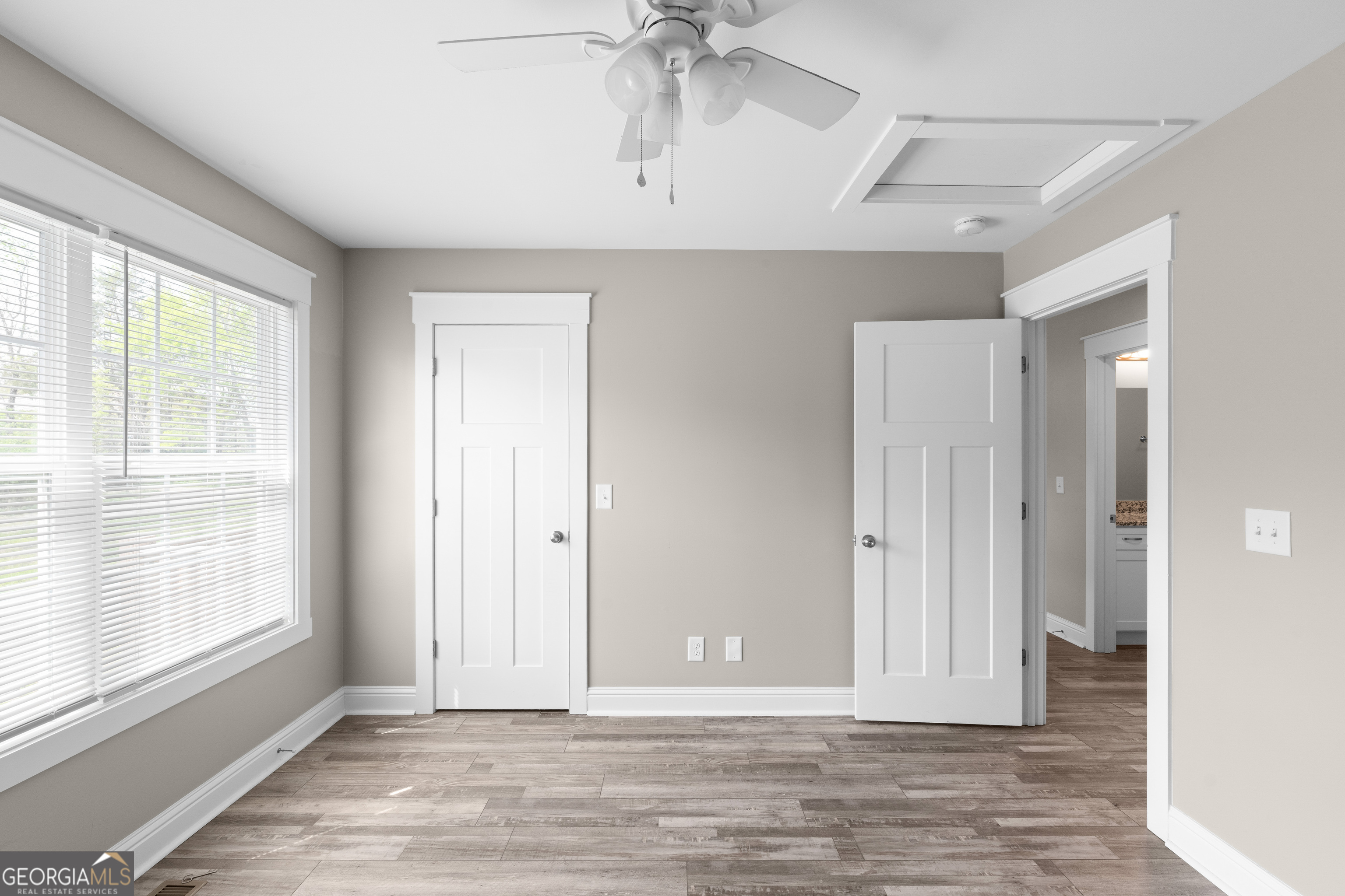 115 Buster Lane Rocky Face, GA 30740 - Photo 22 of 28 a view of a livingroom with a window and wooden floor