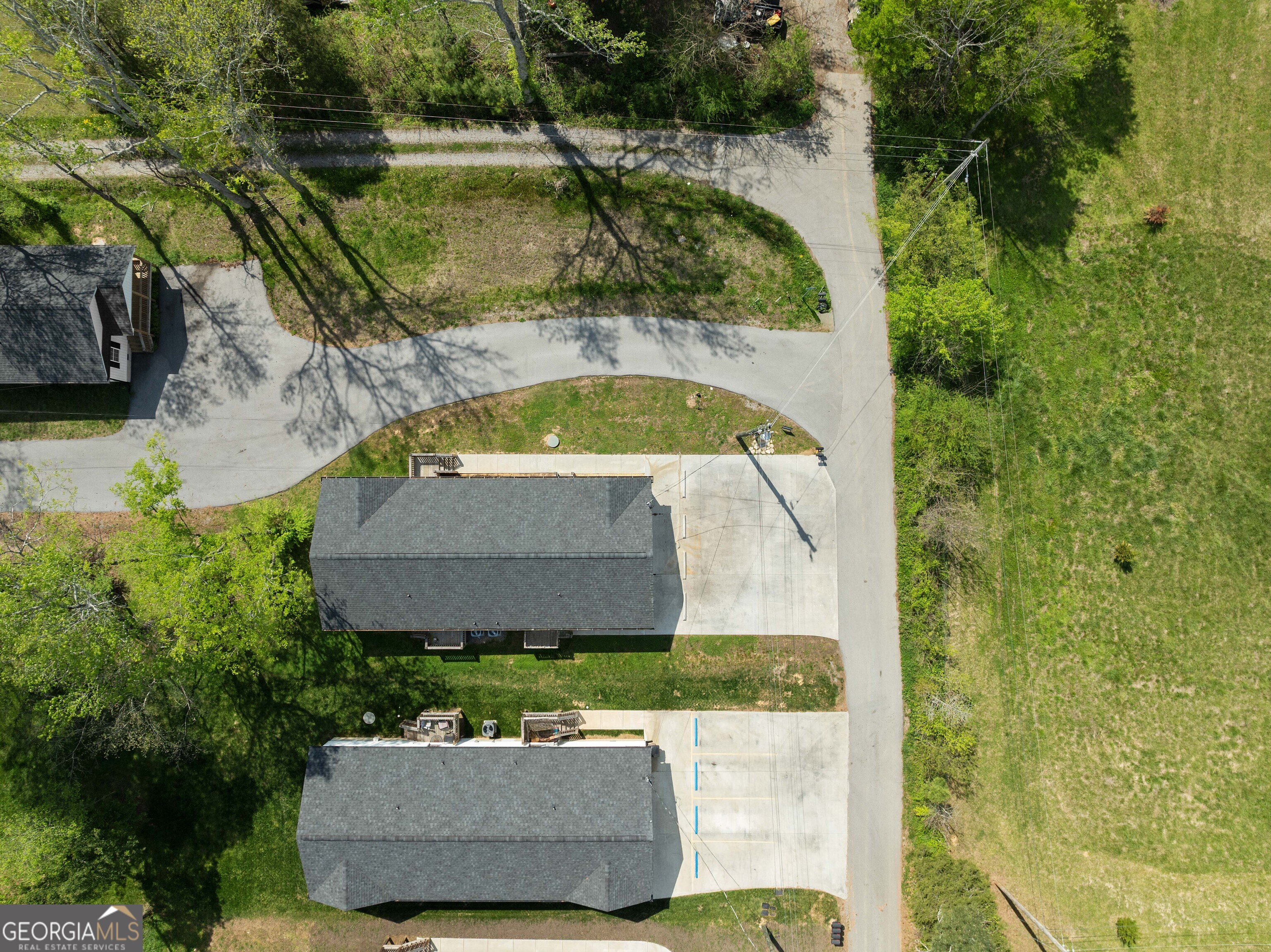 115 Buster Lane Rocky Face, GA 30740 - Photo 3 of 28 an aerial view of a house with swimming pool and garden