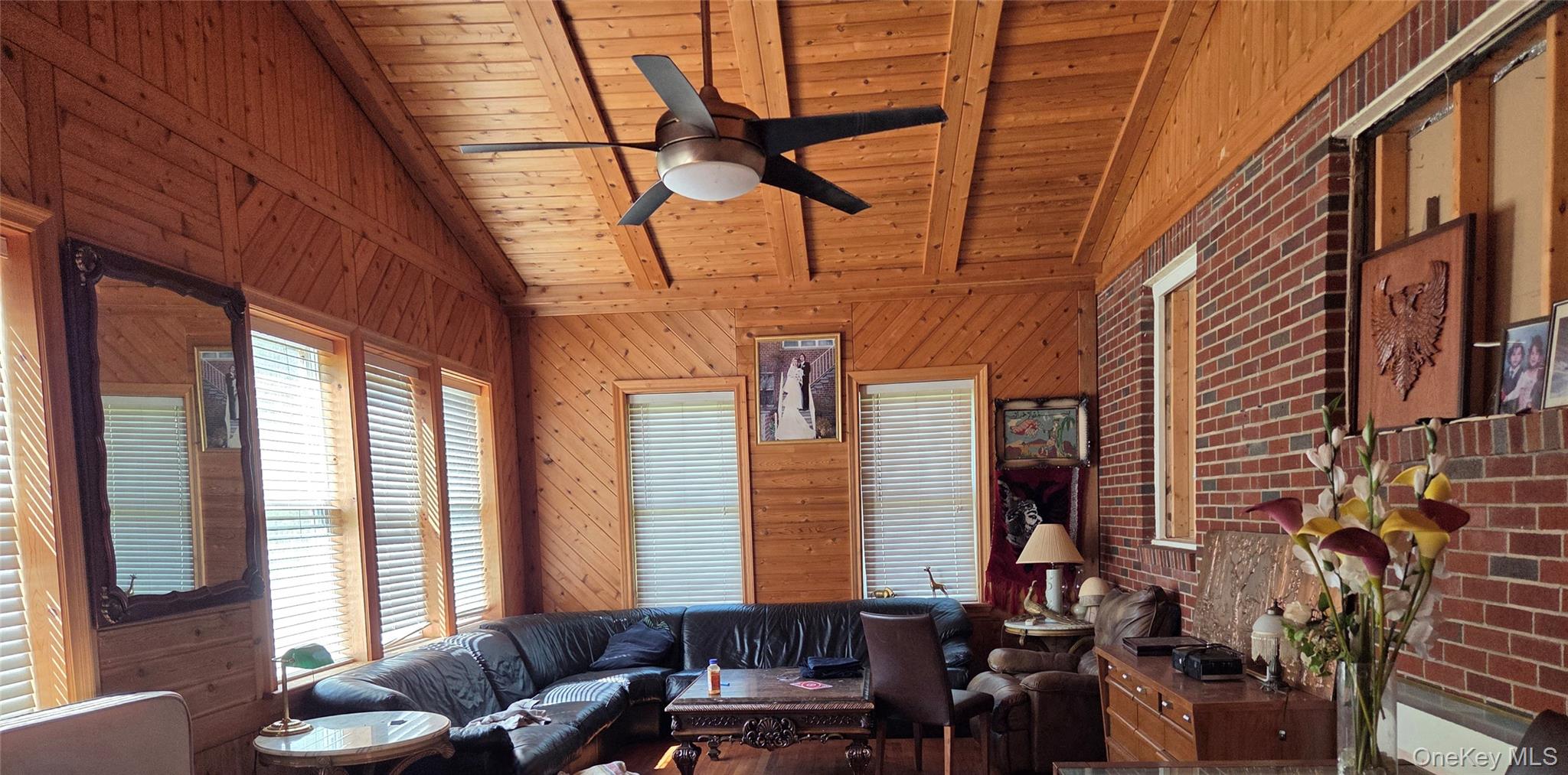 125 Zimmerman Road Loch Sheldrake, NY 12759 - Photo 17 of 43 a living room with furniture and a window