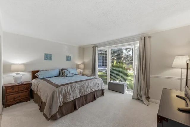 a bathroom with double sink and a mirror