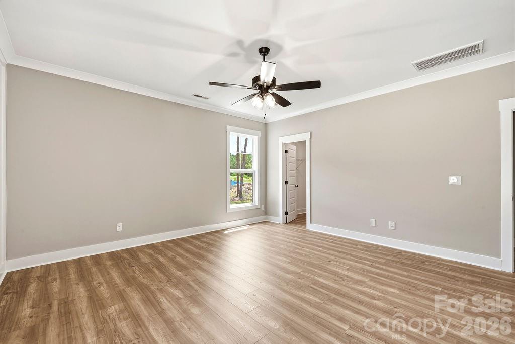 1020 Baylor Grove Road, Unit 20 Monroe, NC 28112 - Photo 29 of 45 a view of room with window and ceiling fan