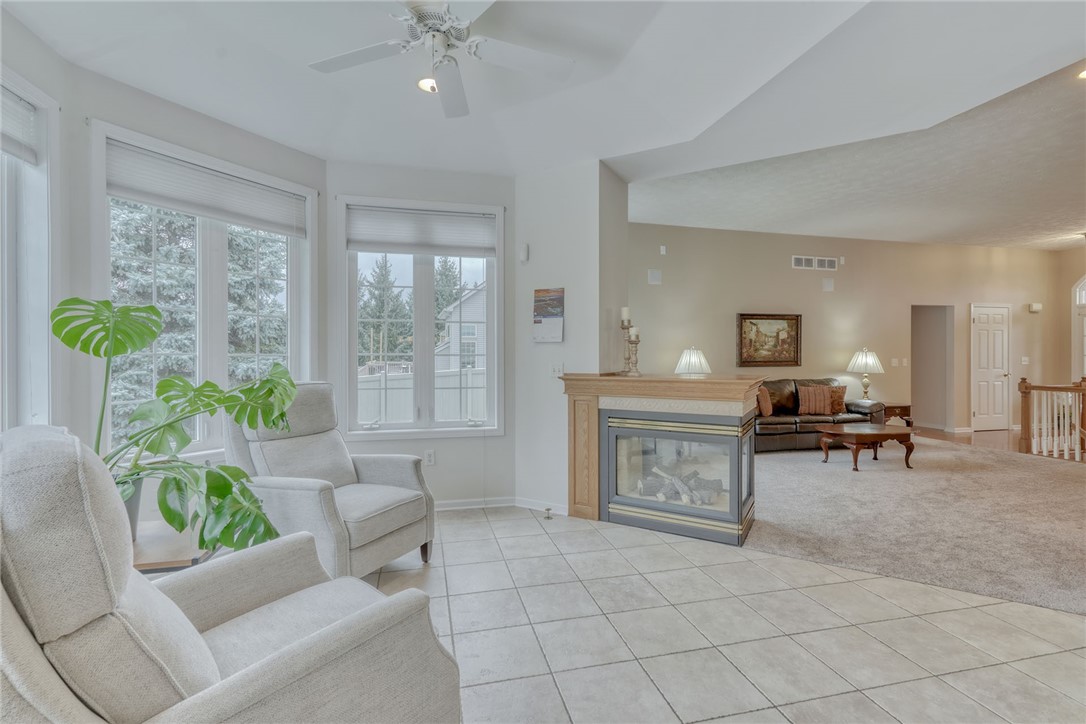 67 Angels Path Penfield, NY 14580 - Photo 14 of 47 SITTING AREA VIEW TO GREAT RM . . FIREPLACE