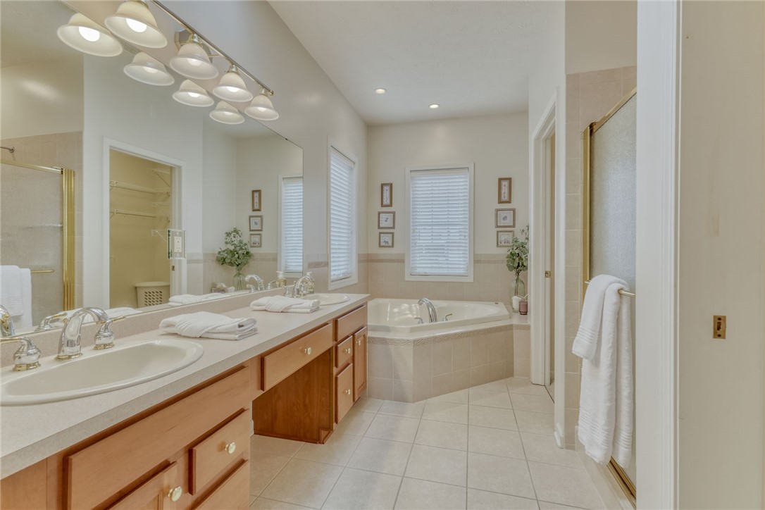 67 Angels Path Penfield, NY 14580 - Photo 26 of 47 MASTER BATH WITH J & J SINKS; TILE FLOORING *SHOWE
