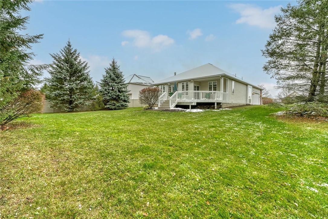 67 Angels Path Penfield, NY 14580 - Photo 39 of 47 BACKYARD VIEW OF THE REAR EXTERIOR