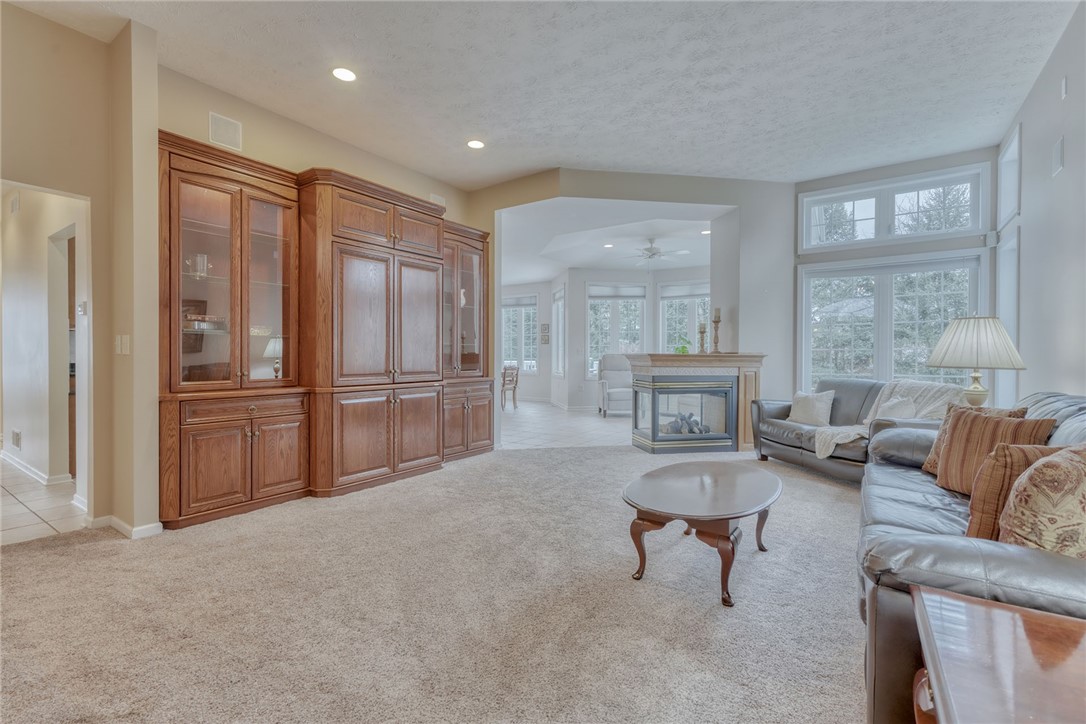 67 Angels Path Penfield, NY 14580 - Photo 9 of 47 GREAT ROOM W/BUILT-IN ENTERTAINMENT CENTER & TWO-W