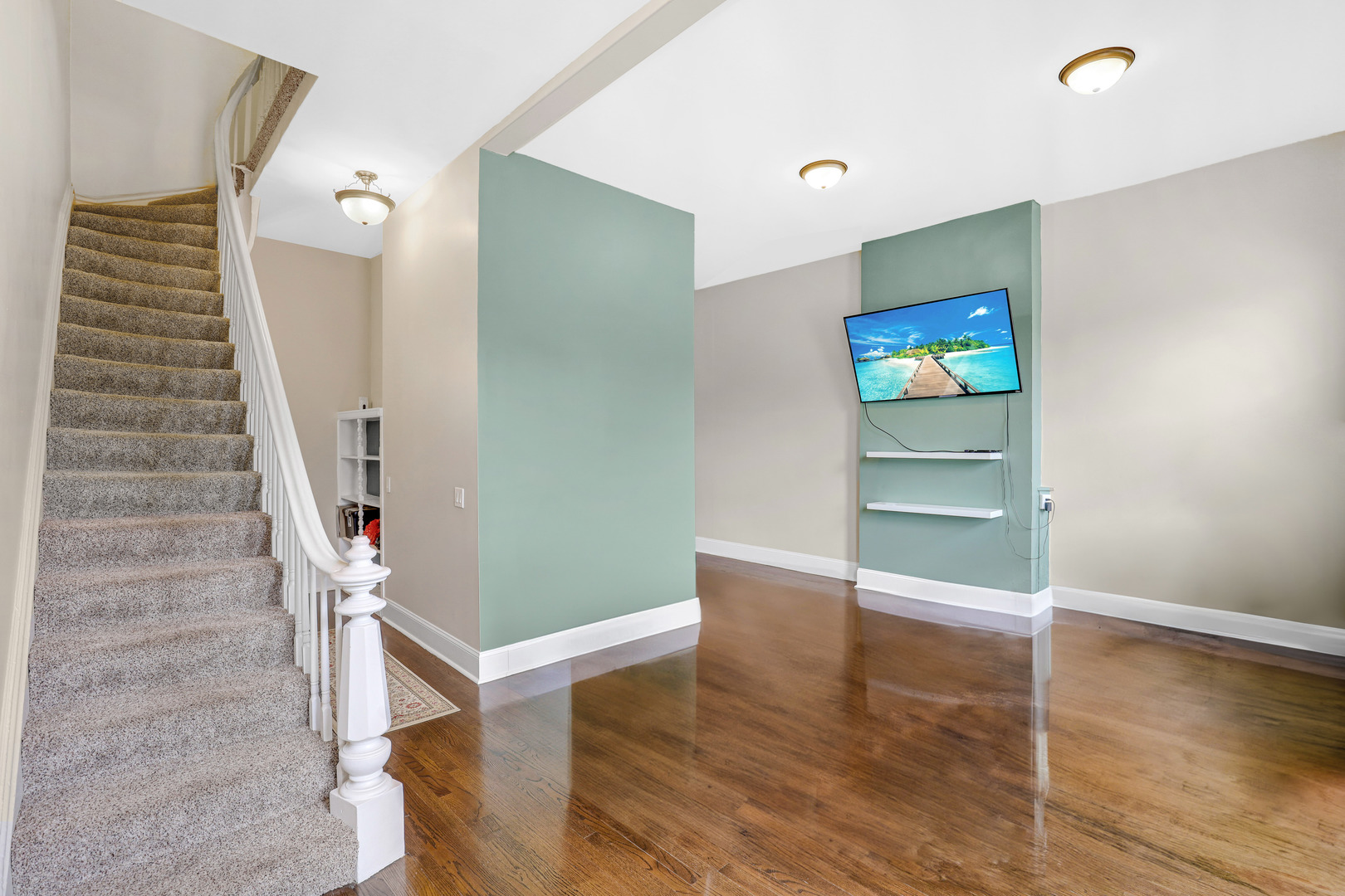 3716 West Cermak Road Chicago, IL 60623 - Photo 10 of 28 a view of entryway with stairs and wooden floor