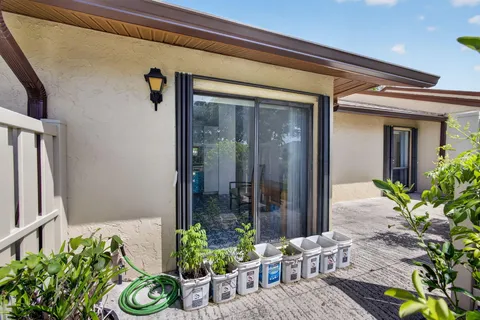 a front view of a house with patio