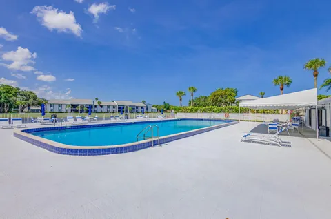 a view of a swimming pool and outdoor space