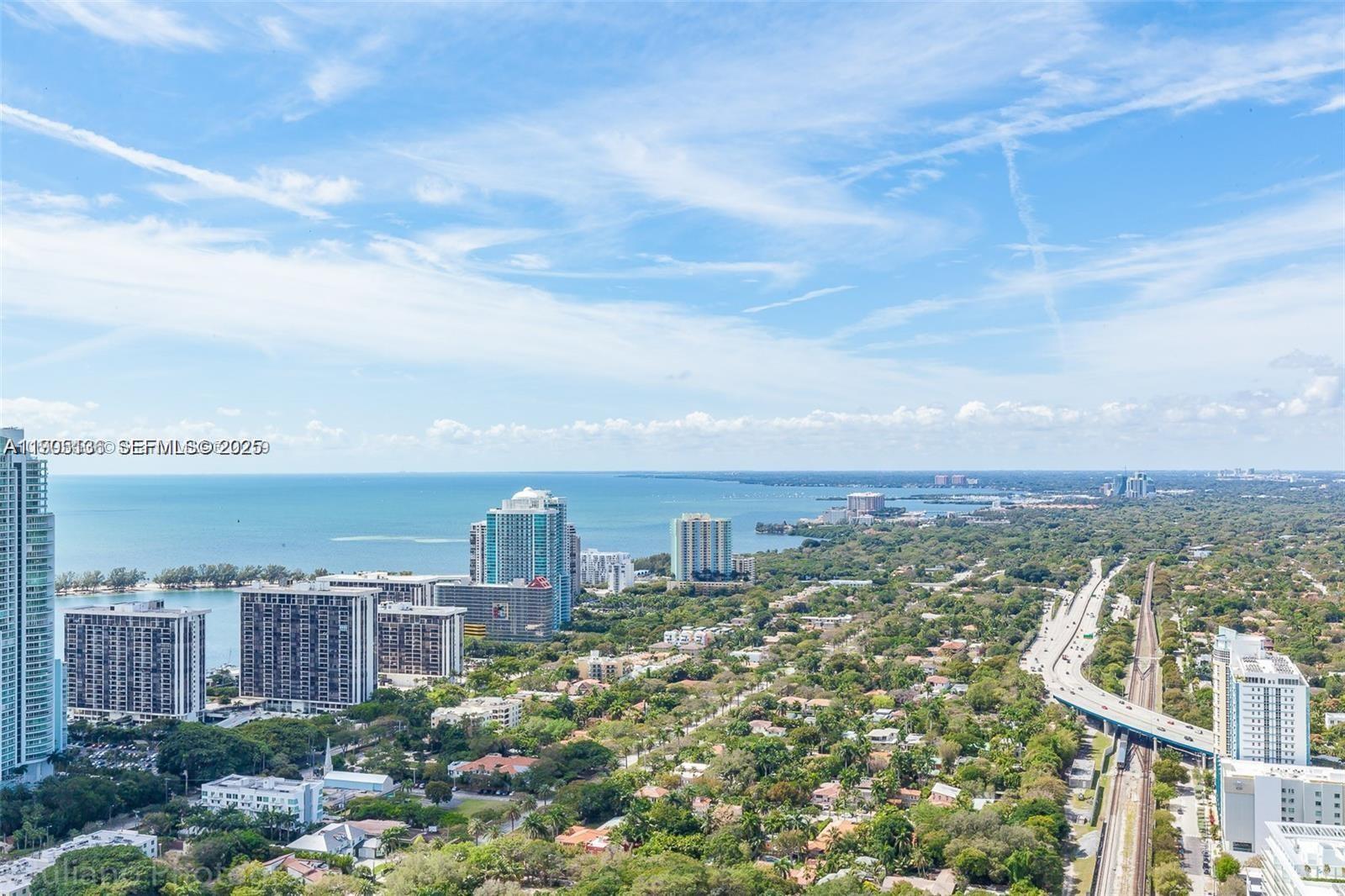 60 Southwest 13th Street, Unit 4205 Miami, FL 33130 - Photo 6 of 14 a view of a city with tall buildings