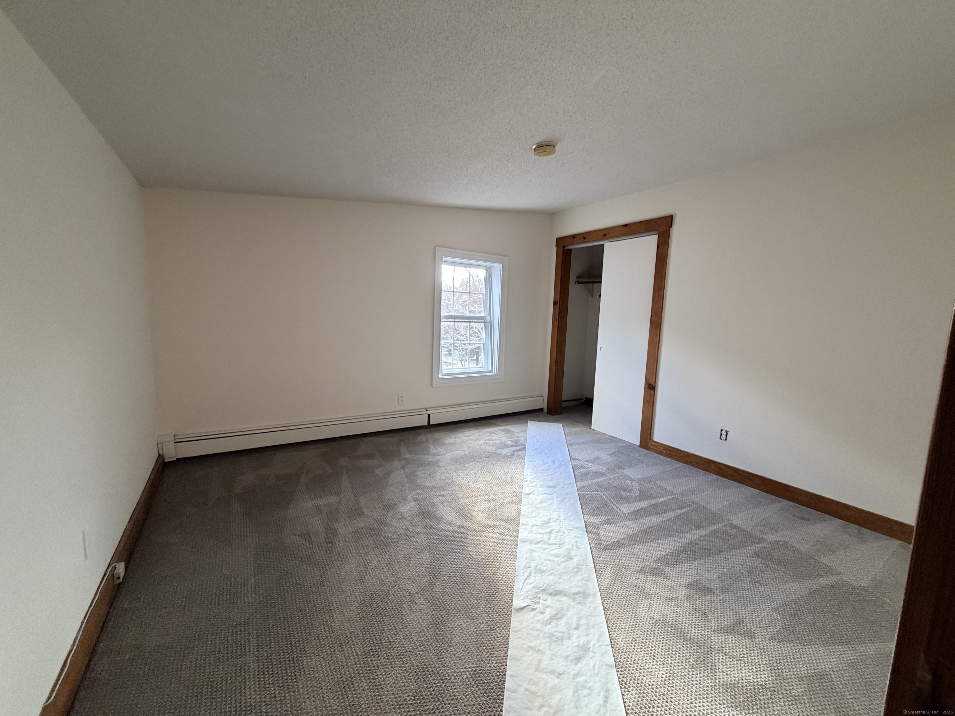 765 Orange Street, Unit 1 New Haven, CT 06511 - Photo 7 of 11 an empty room with window