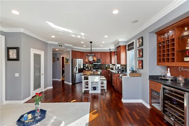 a view of a house with a yard and sitting area