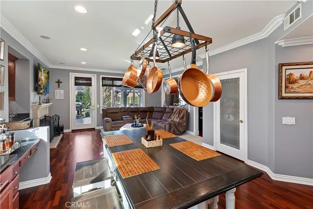 a view of a backyard with plants and patio