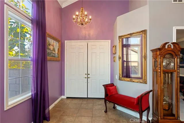 a view of entryway dining room and hall with wooden floor