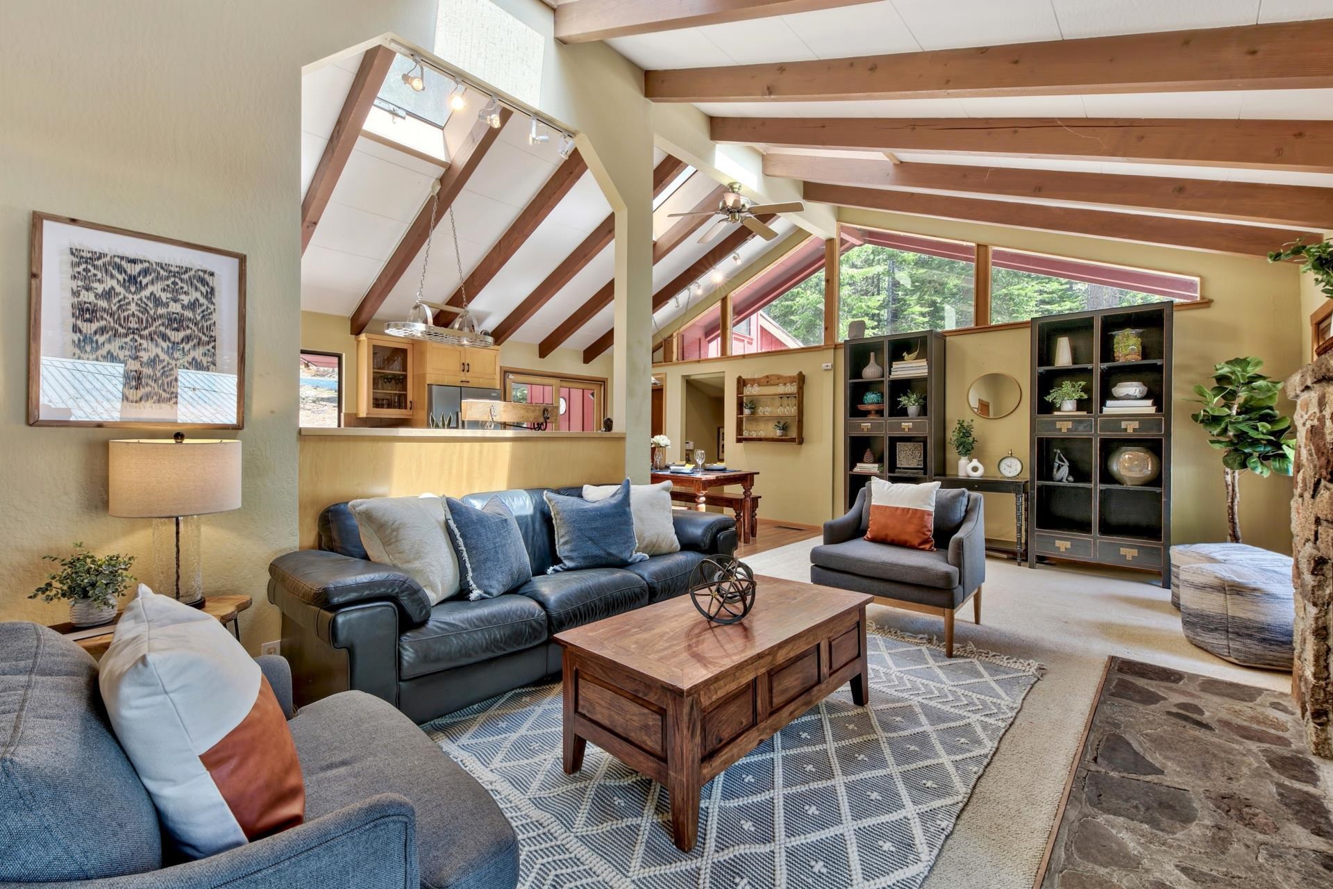 10101 Gregory Place Truckee, CA 96161 - Photo 9 of 21 a living room with furniture a rug and a window