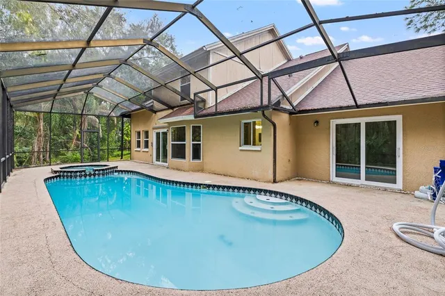 a backyard of a house with lots of green space