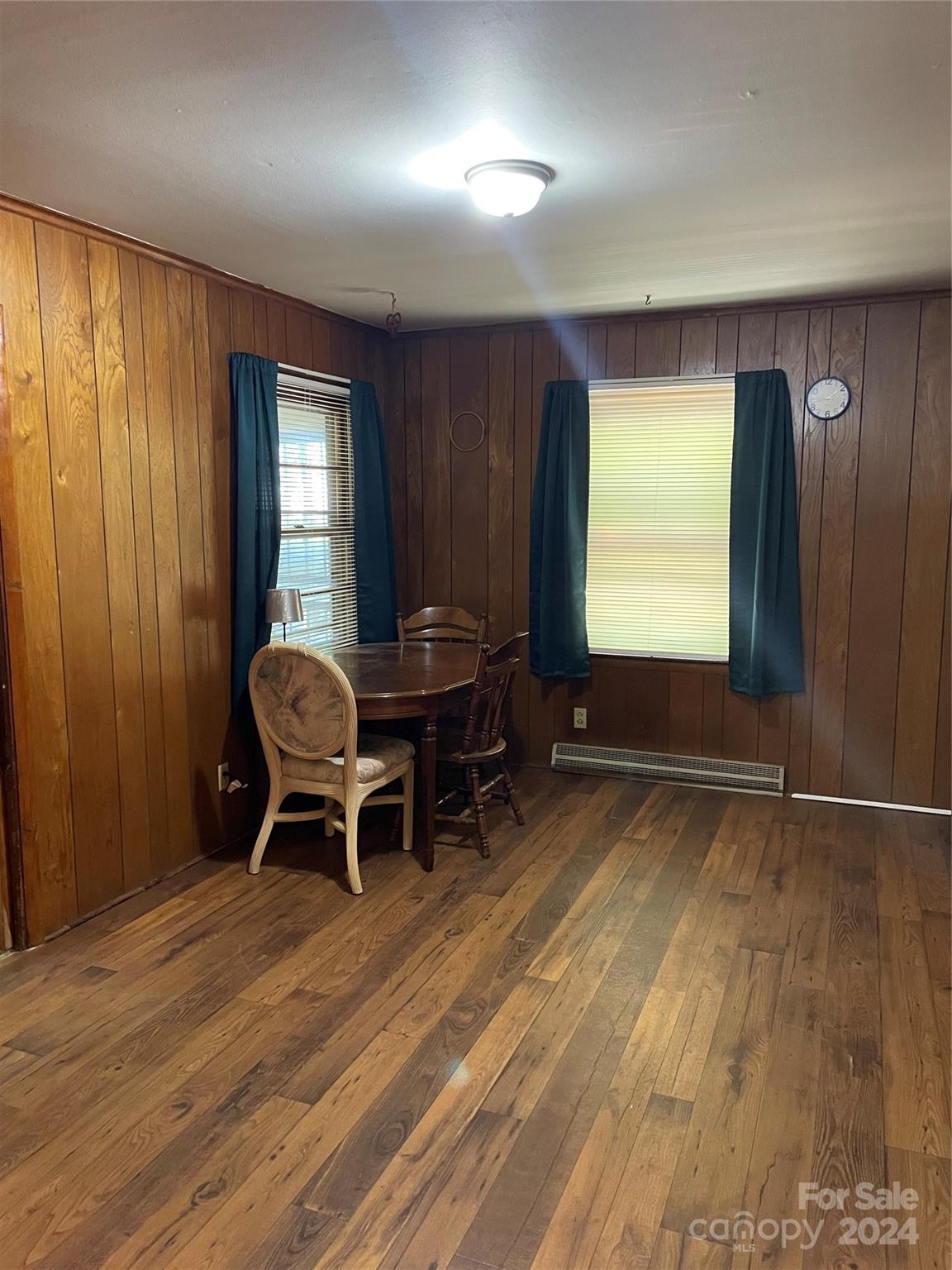 2508 Dora Drive Charlotte, NC 28215 - Photo 14 of 18 a room with chairs and window