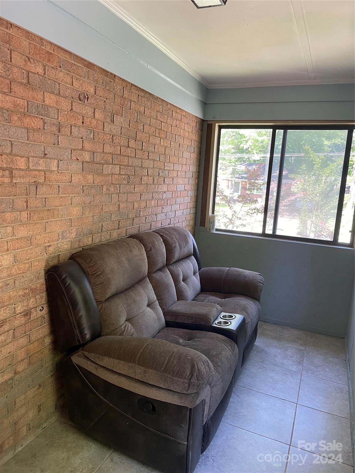 2508 Dora Drive Charlotte, NC 28215 - Photo 18 of 18 a living room with furniture and a large window