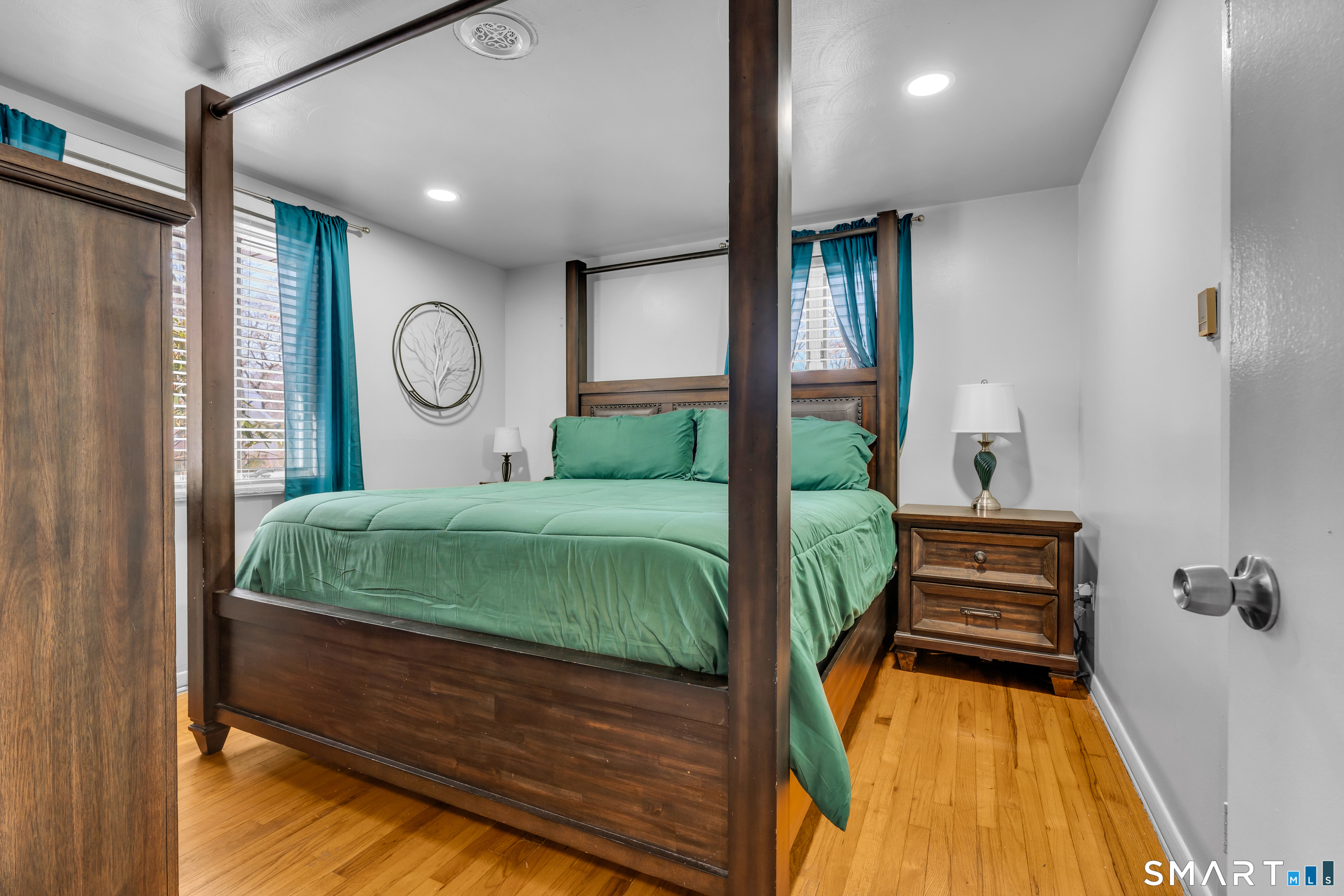 3 Hilltop Drive Ledyard, CT 06339 - Photo 16 of 34 a bedroom with a bed and a window