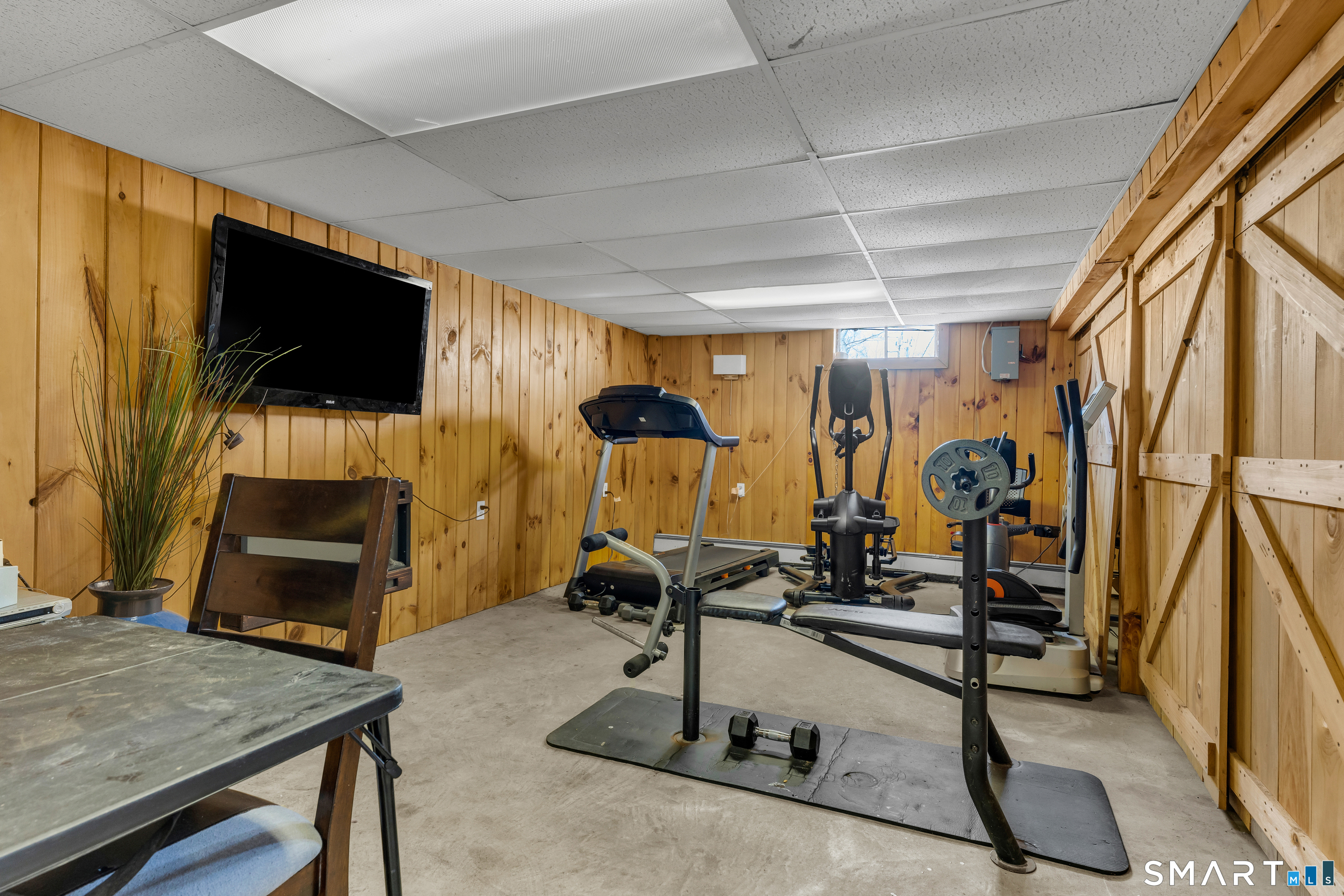 3 Hilltop Drive Ledyard, CT 06339 - Photo 25 of 34 a view of a room with gym equipment