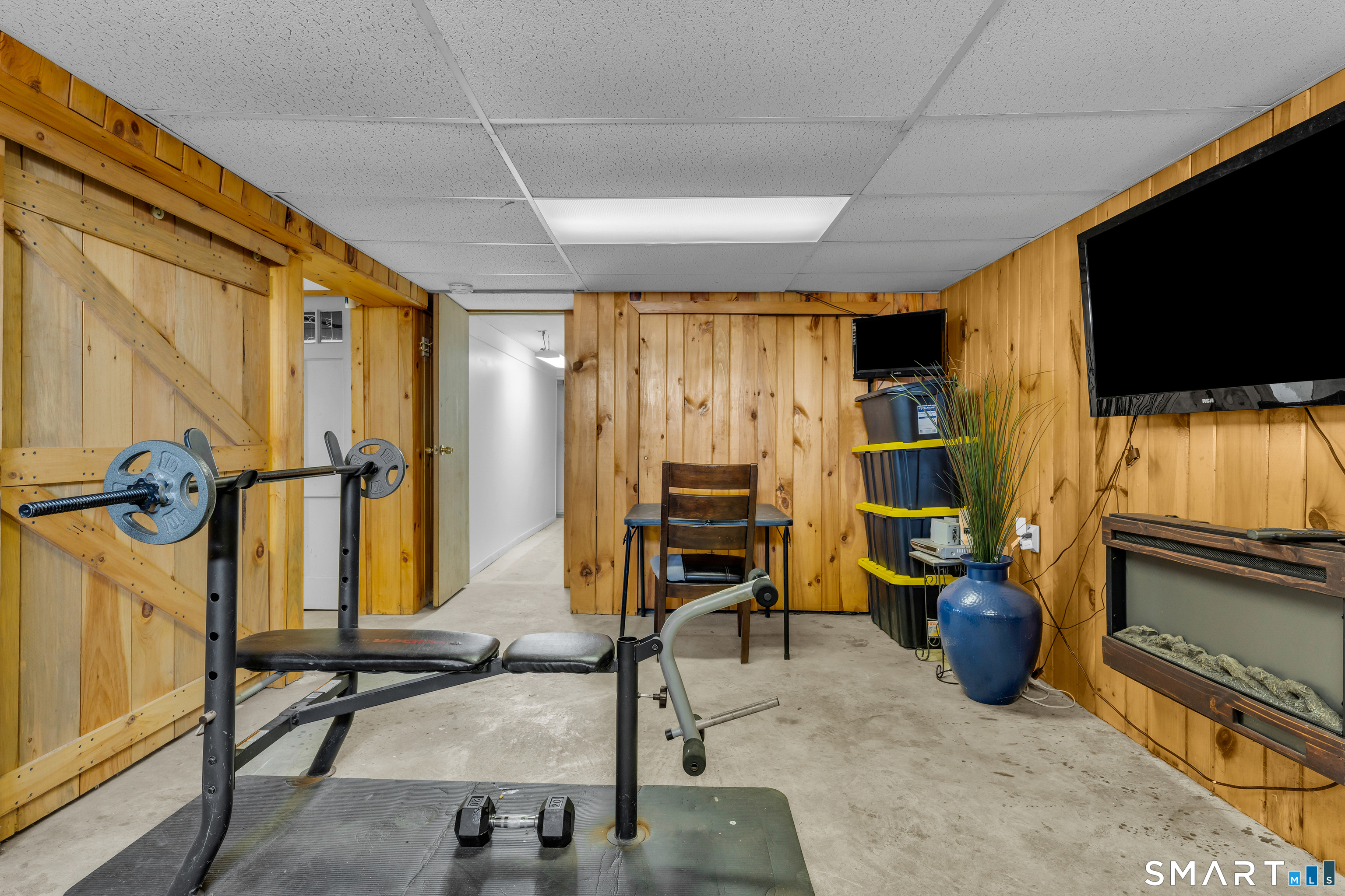 3 Hilltop Drive Ledyard, CT 06339 - Photo 26 of 34 a view of a room with gym equipment