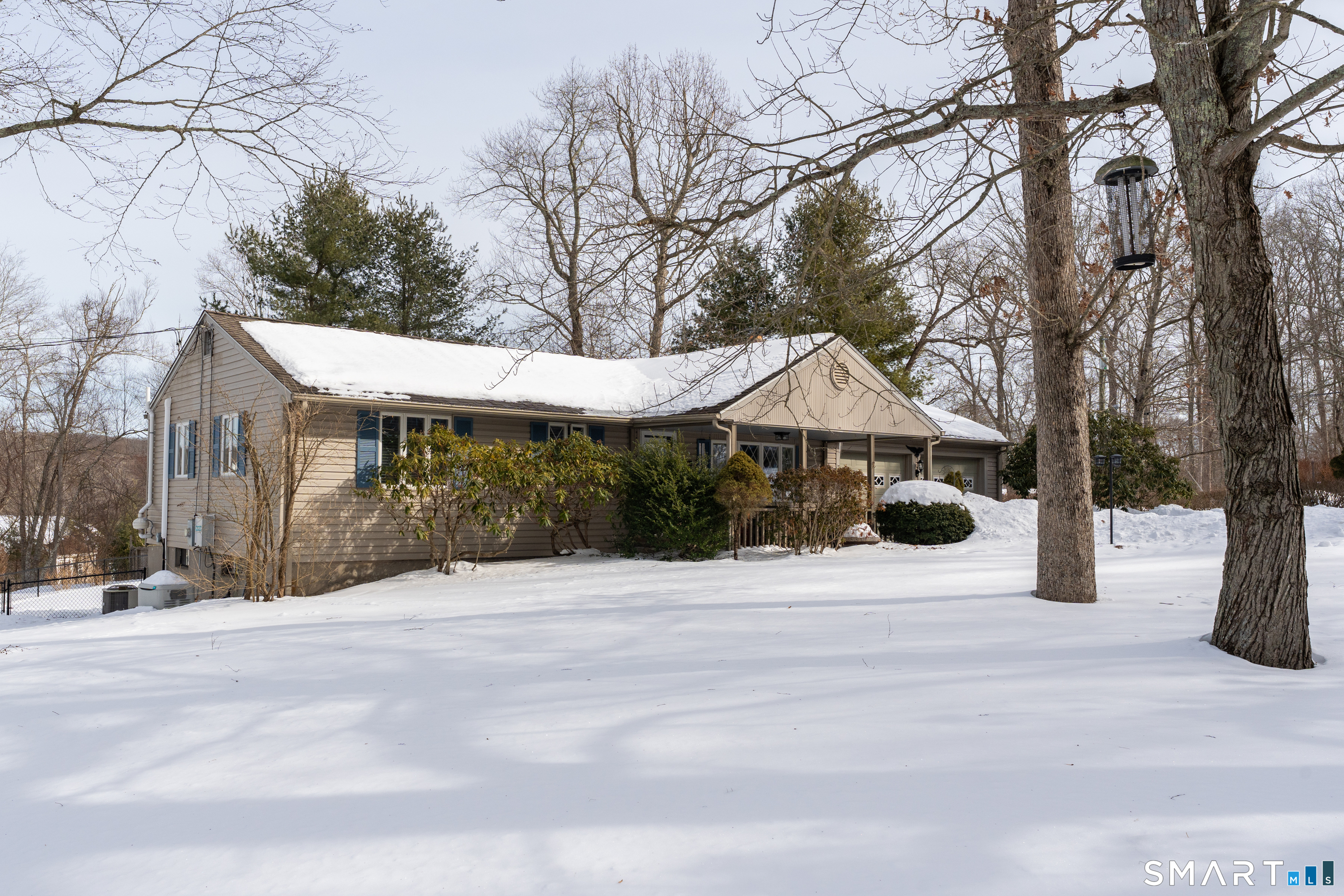 3 Hilltop Drive Ledyard, CT 06339 - Photo 3 of 34 a front view of a house with a yard and tree