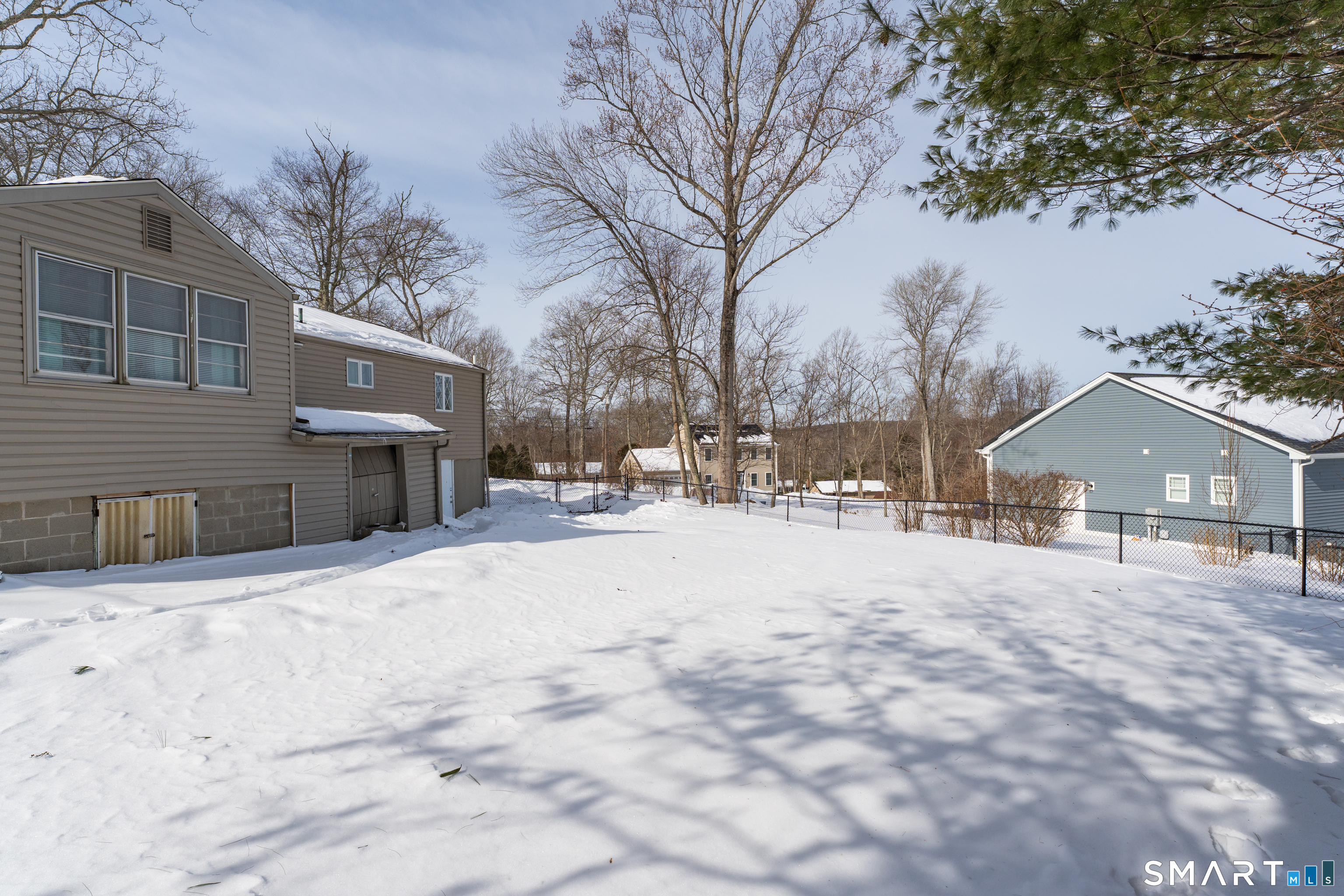 3 Hilltop Drive Ledyard, CT 06339 - Photo 31 of 34 a view of a yard with snow on the road