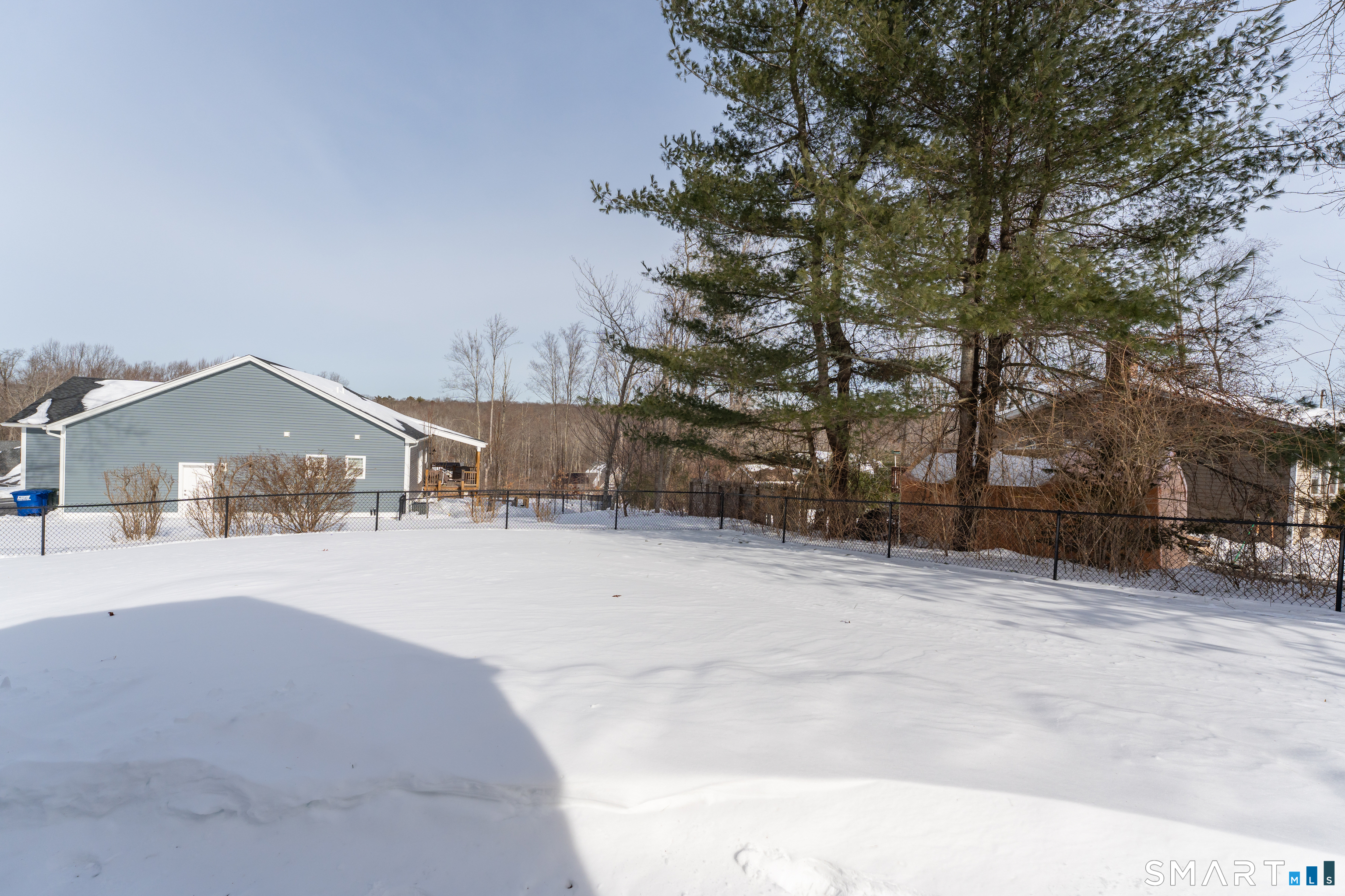 3 Hilltop Drive Ledyard, CT 06339 - Photo 32 of 34 front view of a house with a yard