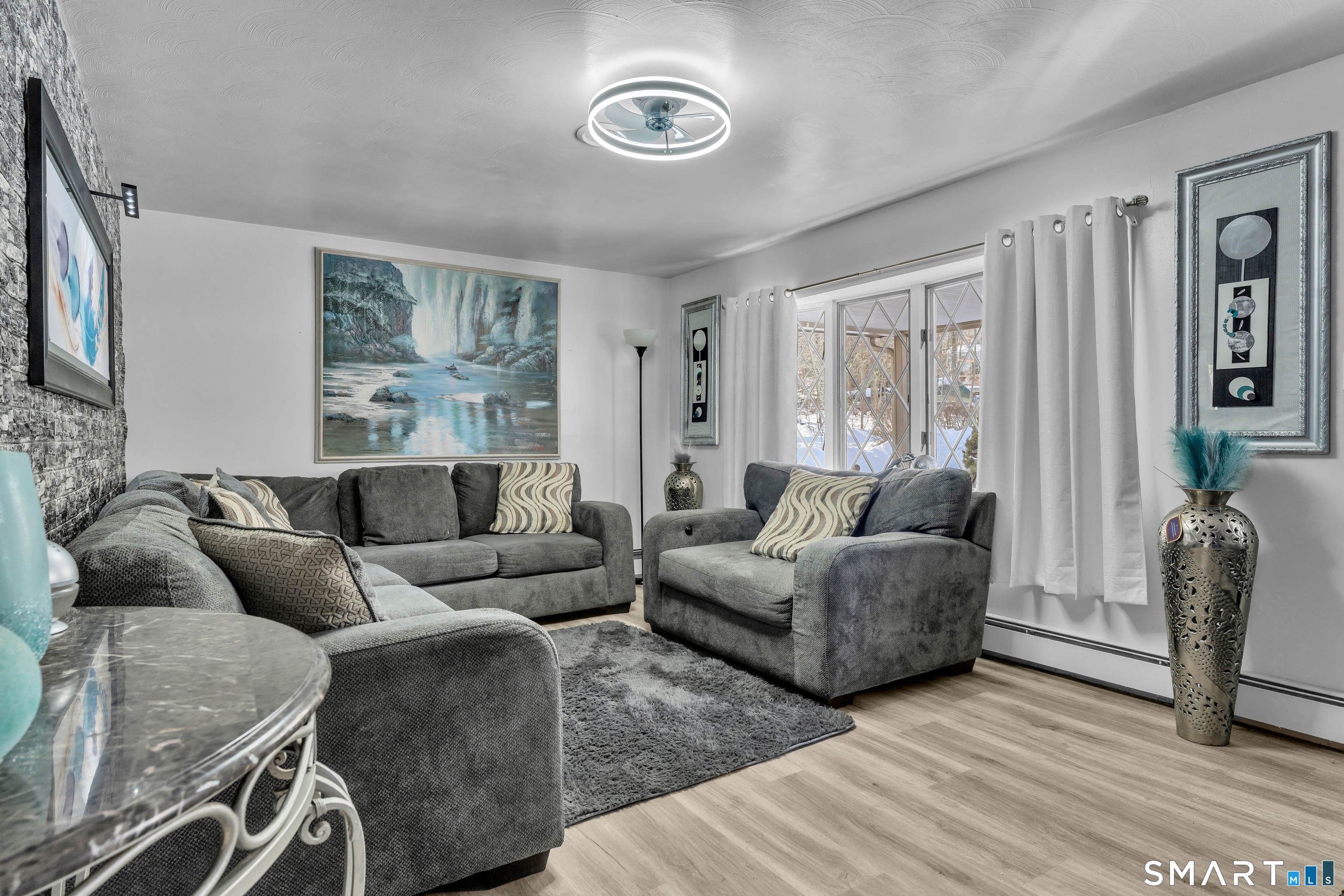 3 Hilltop Drive Ledyard, CT 06339 - Photo 8 of 34 a living room with furniture and a window