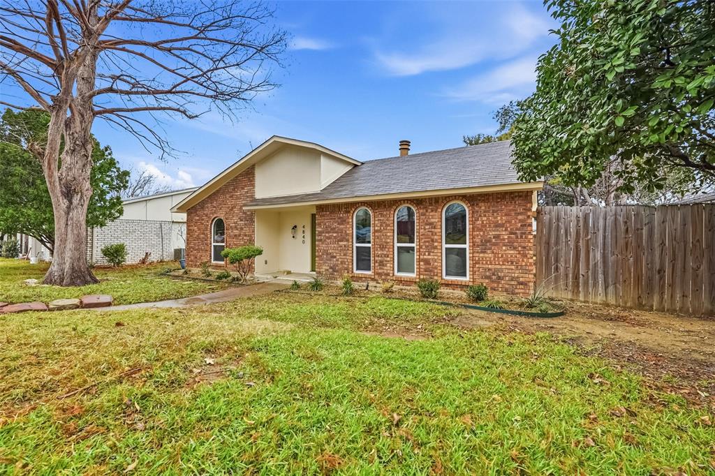 4840 Graham Court The Colony, TX 75056 - Photo 2 of 23 a front view of a house with a garden