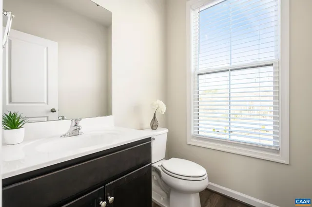 a view of storage and utility room with closet