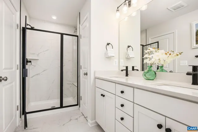 a large building with a tree in front of it