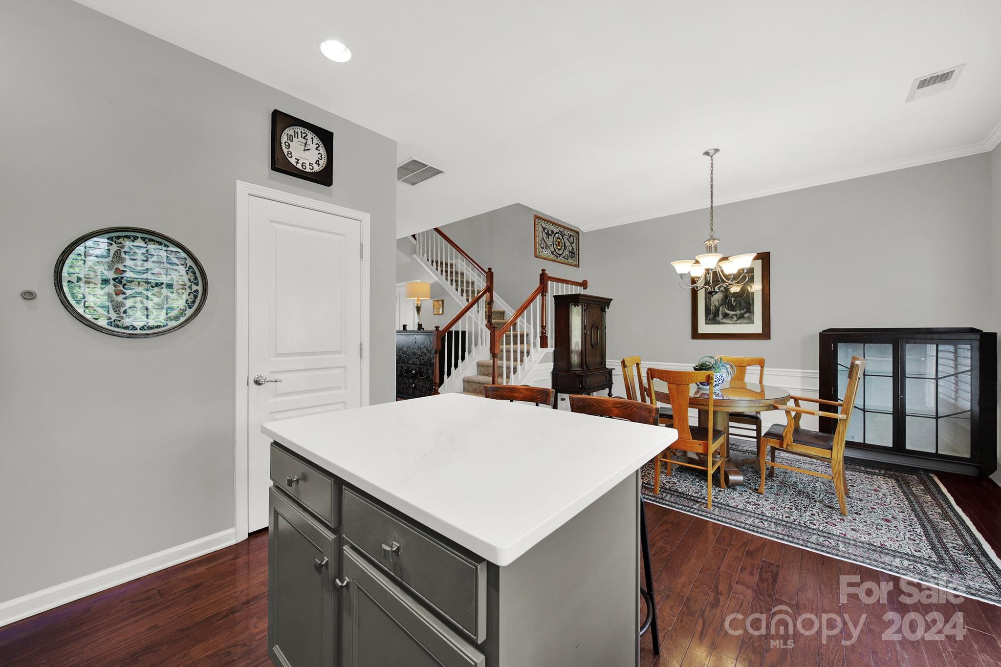 581 6th Baxter Crossing Fort Mill, SC 29708 - Photo 13 of 30 a view of a kitchen with a table and chairs