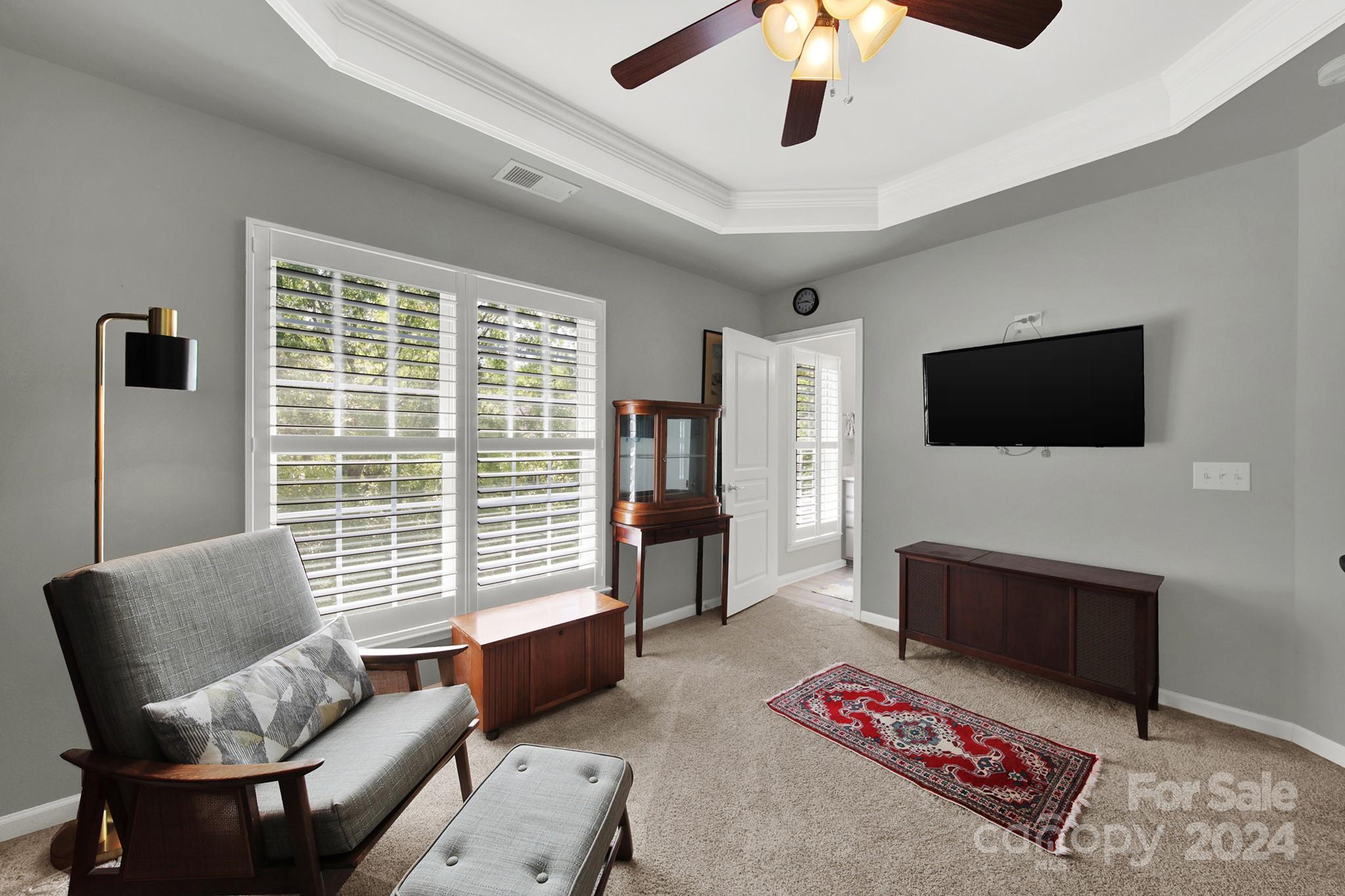 581 6th Baxter Crossing Fort Mill, SC 29708 - Photo 15 of 30 a living room with furniture and a flat screen tv