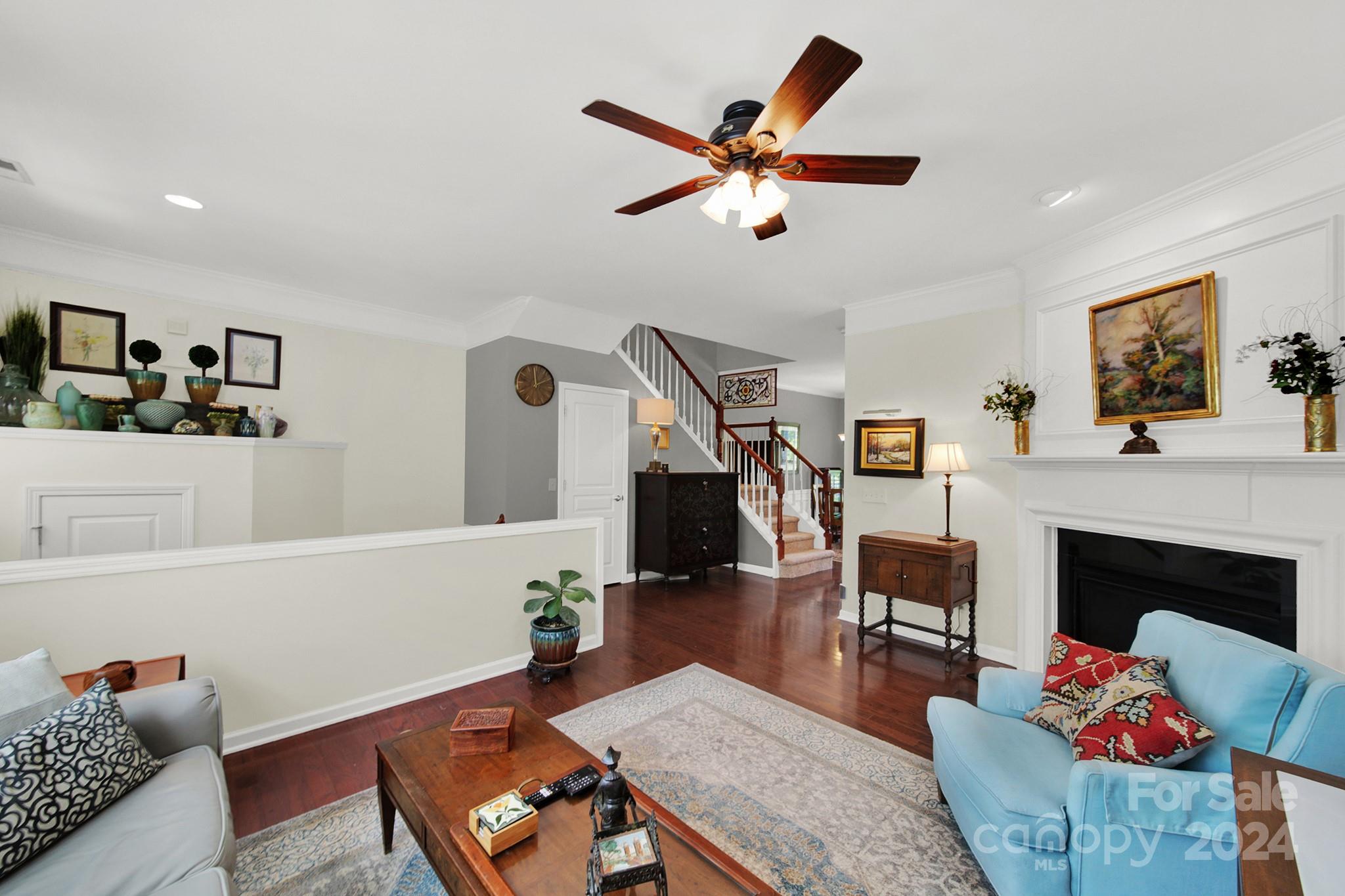581 6th Baxter Crossing Fort Mill, SC 29708 - Photo 6 of 30 a living room with furniture and a fireplace