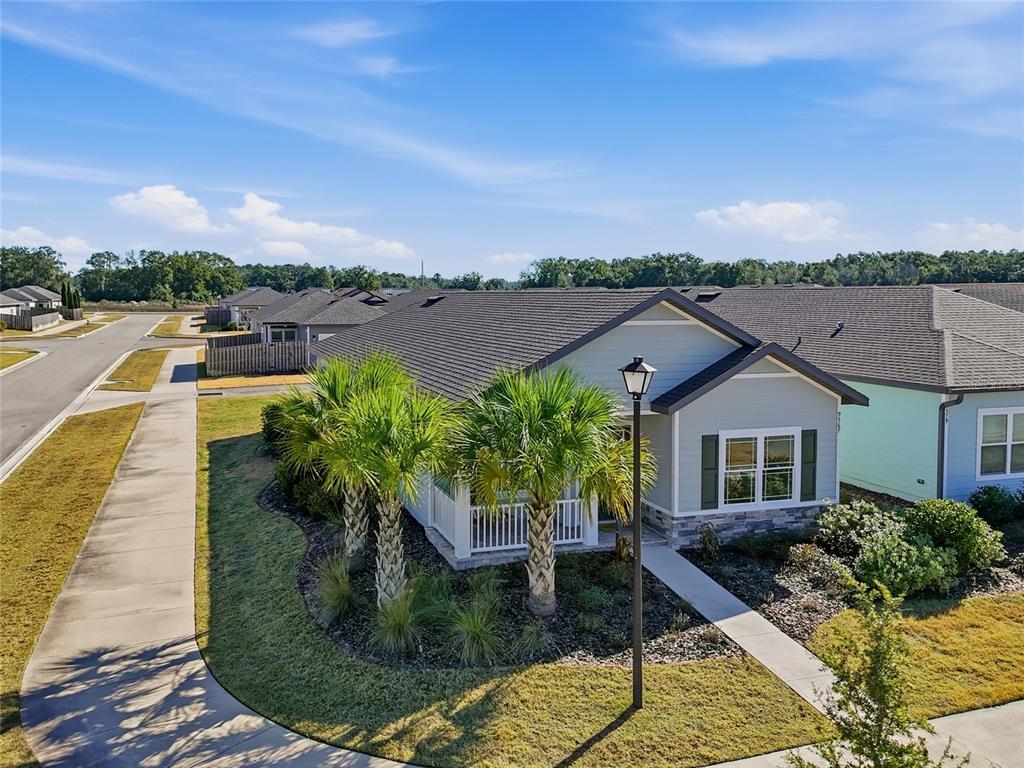 9567 Southwest 66th Lane Gainesville, FL 32608 - Photo 4 of 20 a view of a house with a yard