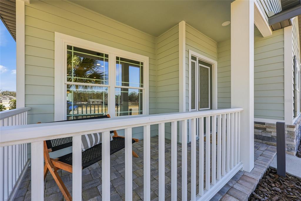 9567 Southwest 66th Lane Gainesville, FL 32608 - Photo 5 of 20 a view of a house with a porch