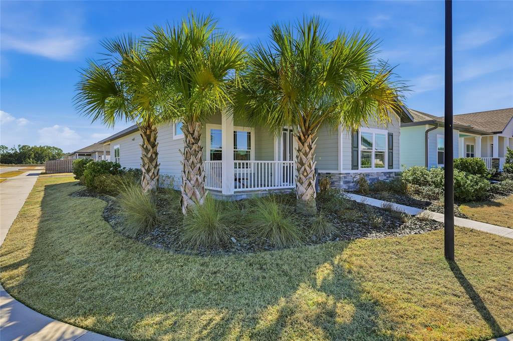9567 Southwest 66th Lane Gainesville, FL 32608 - Photo 6 of 20 a front view of house with yard and trees
